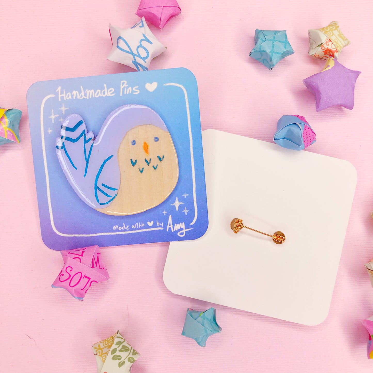 A Cute Handmade Round Boi Bluebird Wooden Pin with Hard Resin Enamel